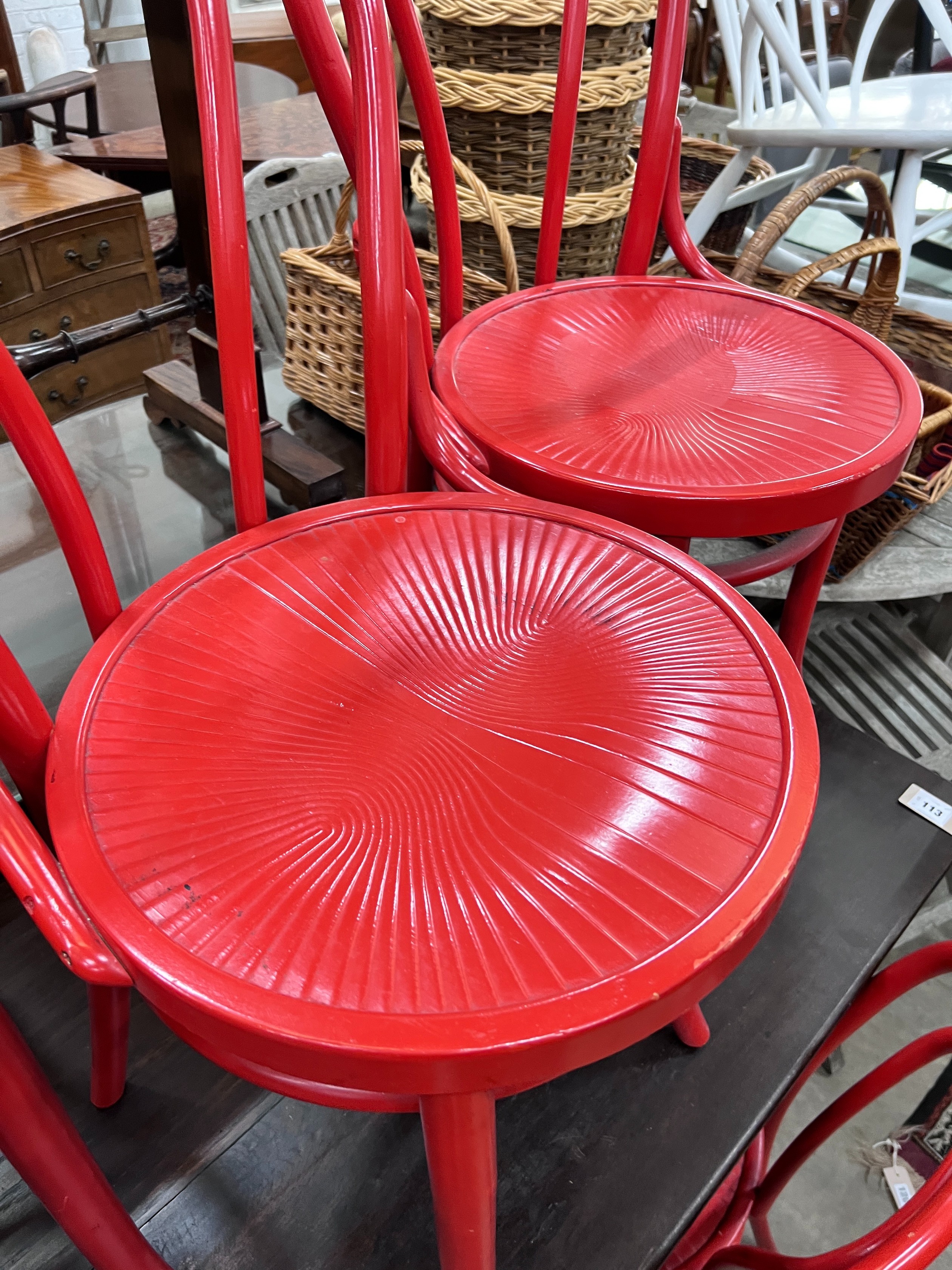 A set of six modern red painted bentwood type dining chairs *Please note the sale commences at 9am.